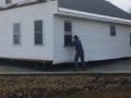 80 Men pick up and move a house_4