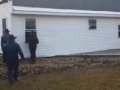 80 Men pick up and move a house_5