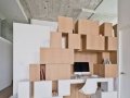 Attached storage wall to stairwell leads to mezzanine_10