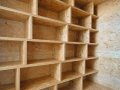 Attached storage wall to stairwell leads to mezzanine_14