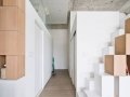 Attached storage wall to stairwell leads to mezzanine_3
