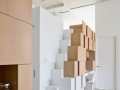 Attached storage wall to stairwell leads to mezzanine_4