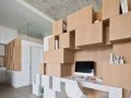 Attached storage wall to stairwell leads to mezzanine_5