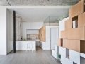 Attached storage wall to stairwell leads to mezzanine_6
