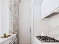 Attached storage wall to stairwell leads to mezzanine_8