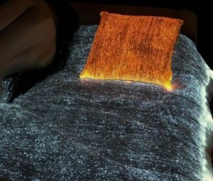 Glowing Bed Cover powered by embedded fiber optics