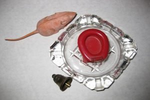 A Bell Toilet Ashtray and Mouse