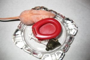 A Bell Toilet Ashtray and Mouse