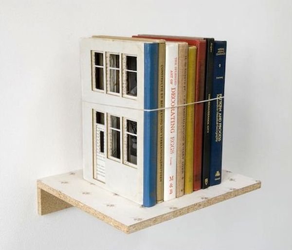 Frank Halmans carves house out of blocks of books Frank Halmans carves house out of blocks of books