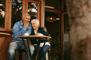 retired couple sitting at table