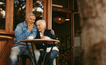 retired couple sitting at table