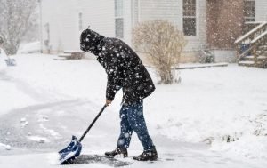 cleaning snow from driveway