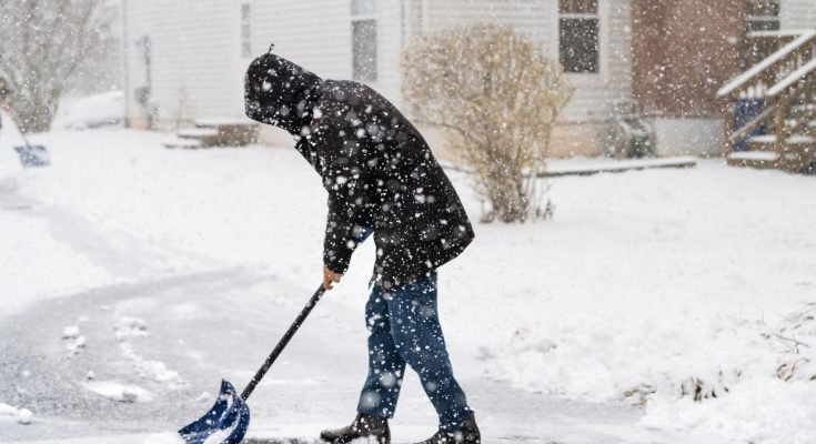 cleaning snow from driveway